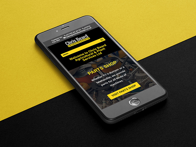 A picture of a black mobile phone infront of a black and yellow background displaying a mobile view of a website called CHris Beard APS